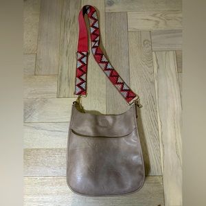 Crossbody bag with colorful removable strap